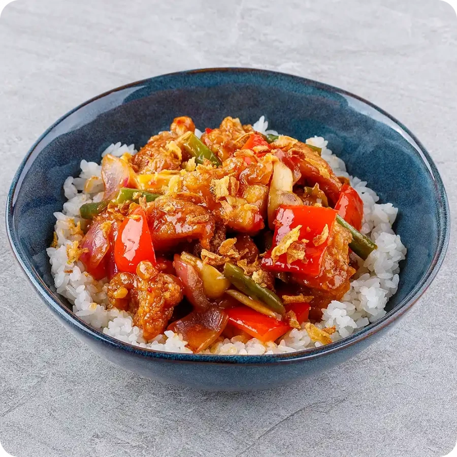 Chicken with rice in sweet and sour sauce